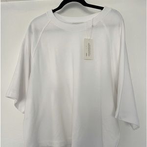Short sleeve light sweater by Vince. White, NWT
